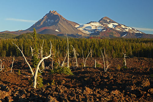 North Sister and Middle Sister with Lava flow on Mckenzie Pass, Cascade Mountains, Oregon